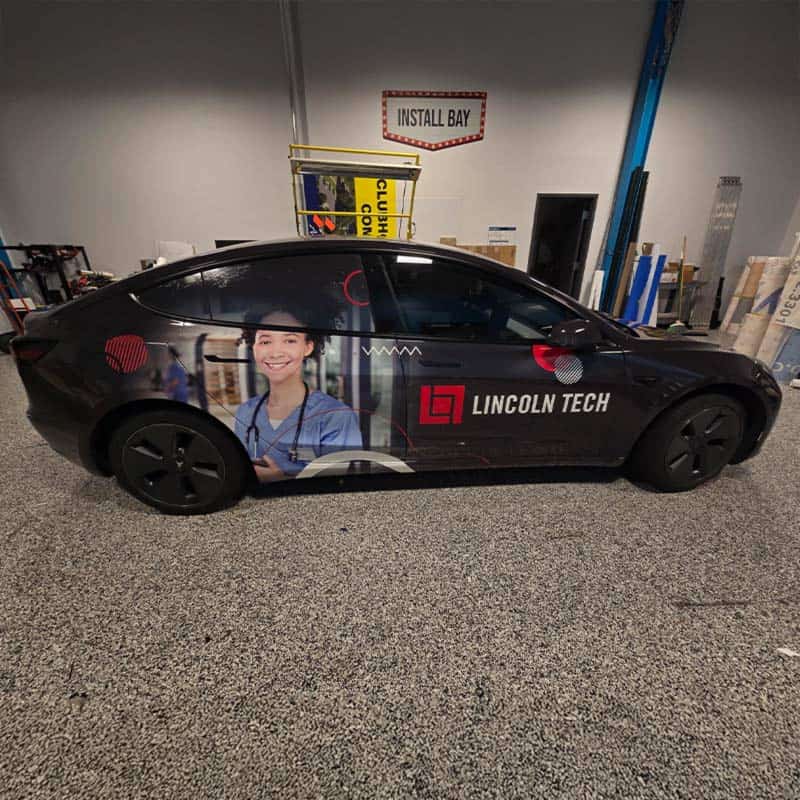A vehicle tech of Lincoln Tech, made by Strategic Factory, with a student nurse on the side.