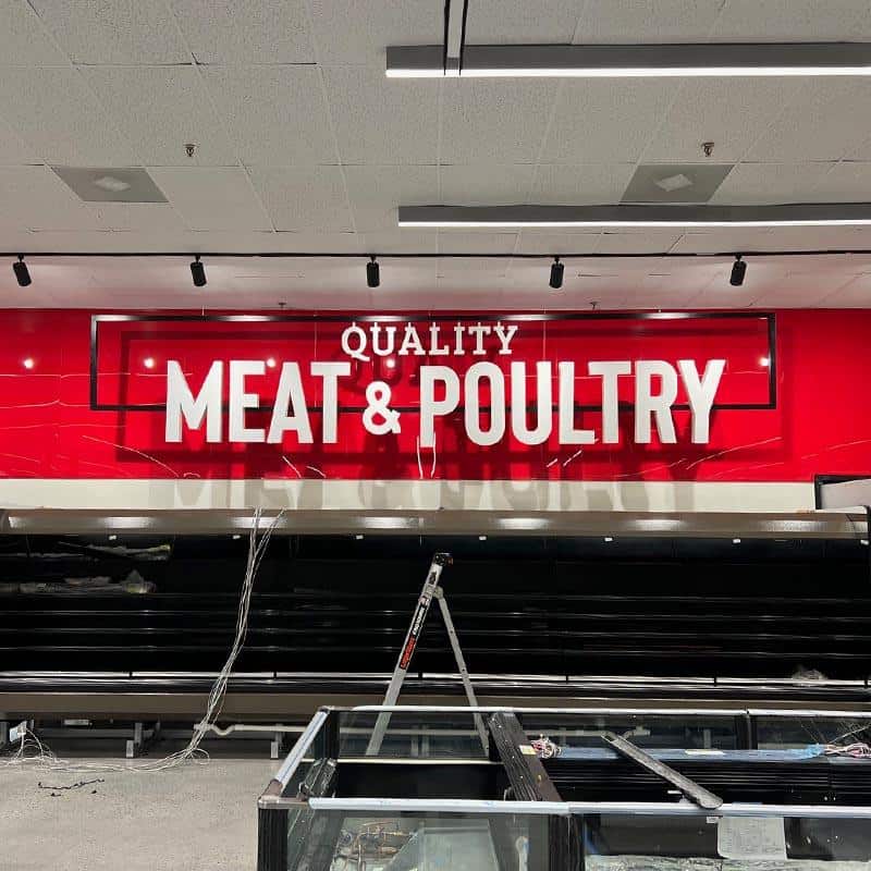 lotte plaza markets meat and poultry signage