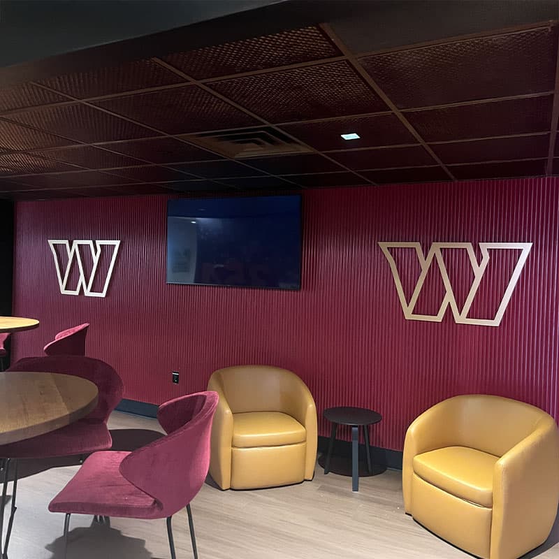 custom cut metal letter signs in the shape of the Washington Commanders 'W'