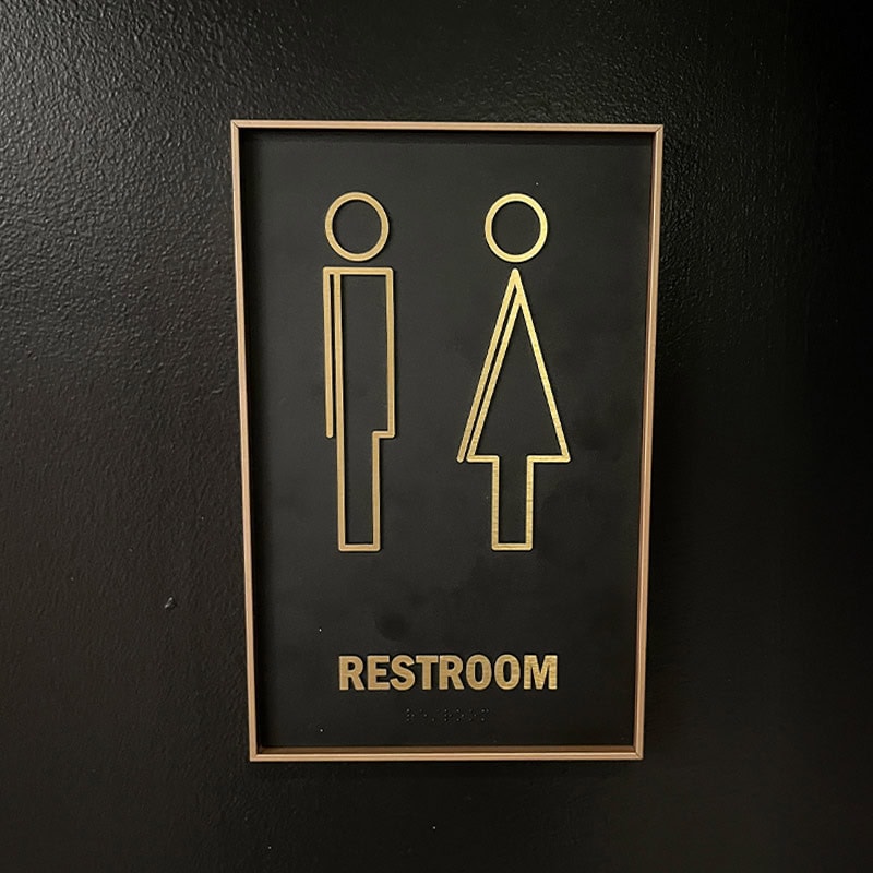 Washington Commanders Legacy Lofts ADA signage produced by Strategic Factory