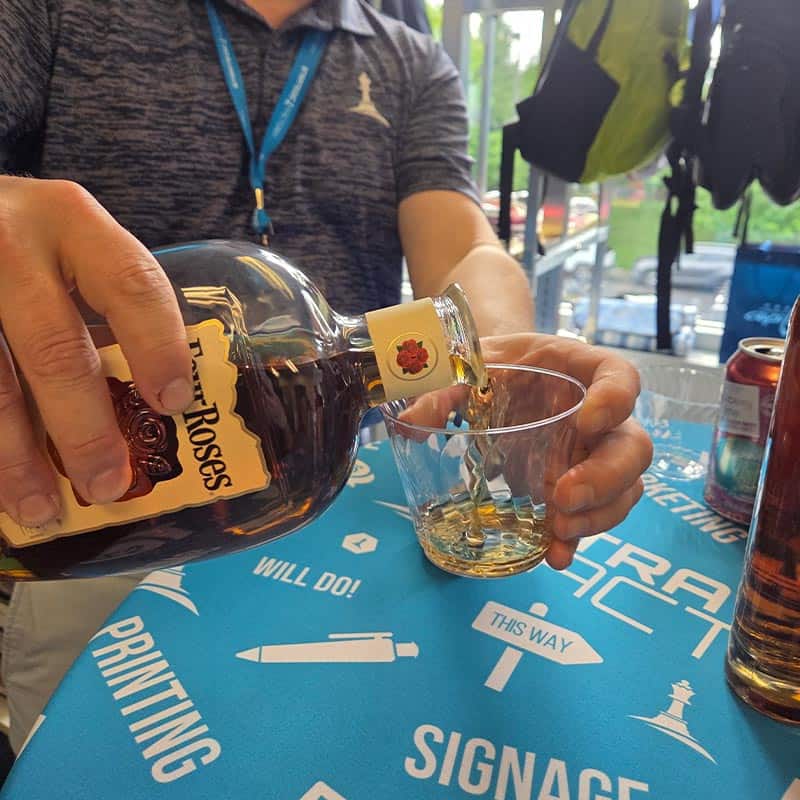 Pouring for bourbon tasting at Strategic Factory.