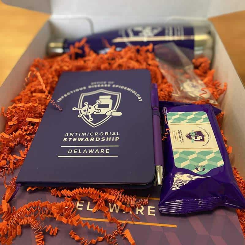 branded promotional box with crinkle paper filling and promotional products