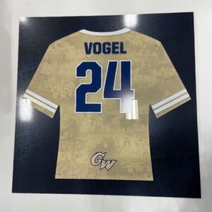 Stadium signage installation displaying a series of top team jerseys, with player #24 Vogel jersey prominently showcased