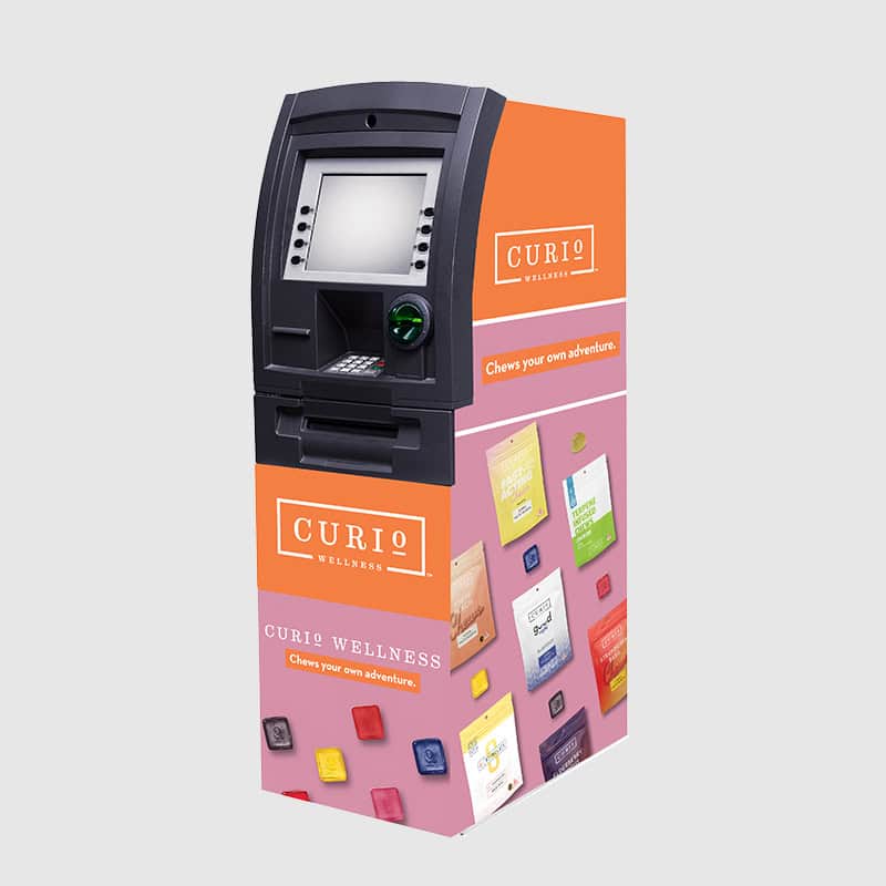 curio wellness custom branded atm wrap