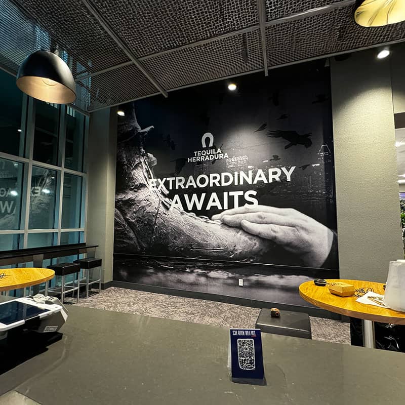 Baltimore Ravens stadium suite-level bar lounge wall wrap with Tequila Herradura branding
